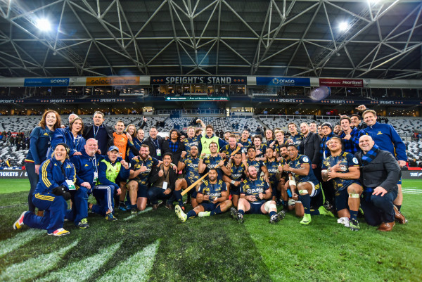 Highlanders celebrate after beating the Lions