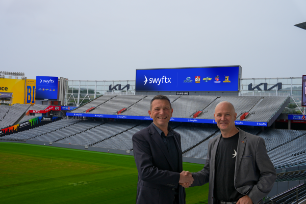 New Zealand Super Rugby Clubs Limited spokesperson, Roger Clark, and Swyftx COO, Paul Quickenden at Eden Park, Auckland