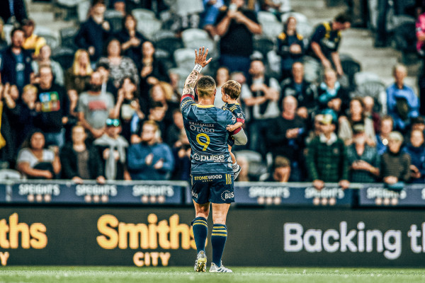 Aaron smith waves to his home crowd